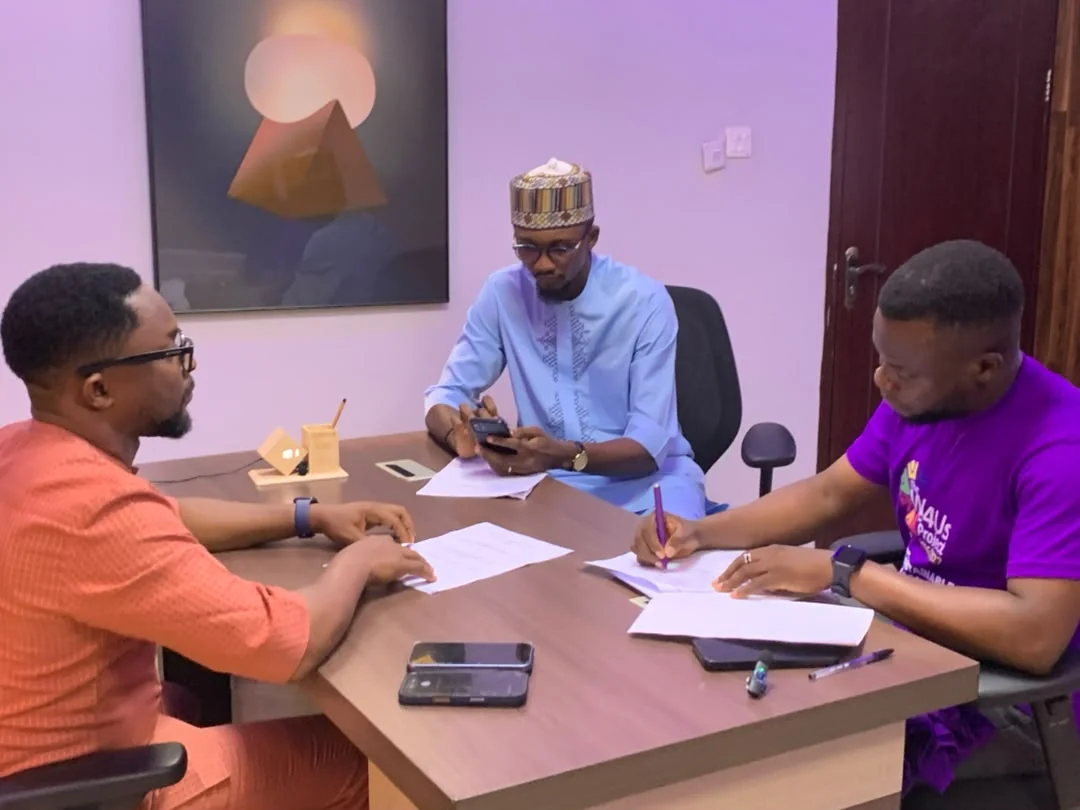 Black African young professionals collaborating in a creative team setting